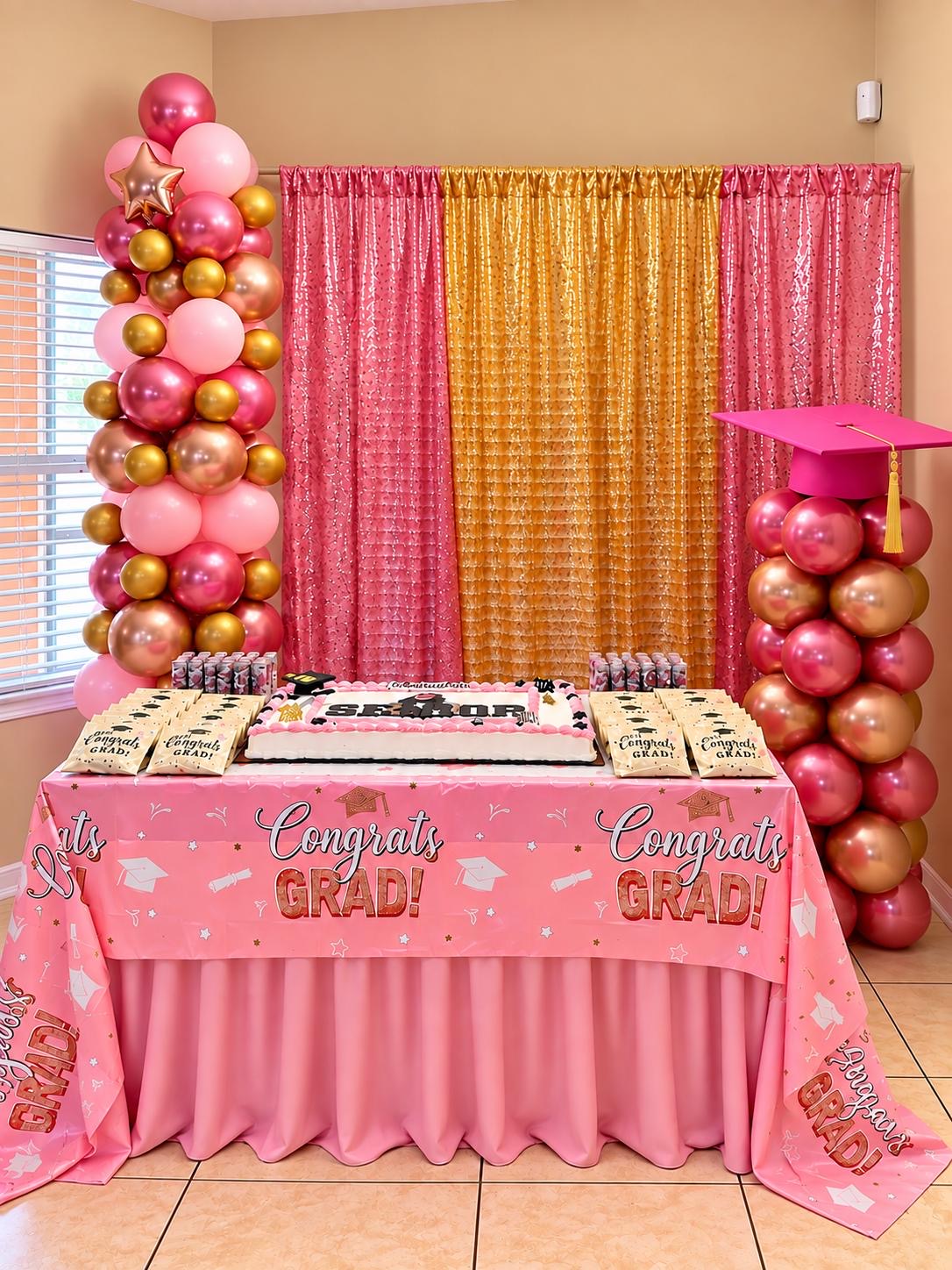 Pink and rose-gold graduation dessert table with balloon column